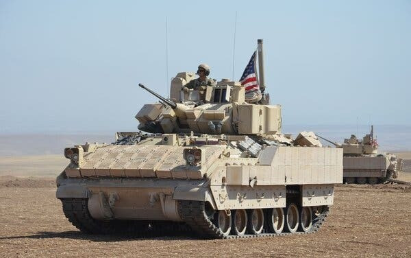 Quân đội Mỹ ở Syria. Ảnh: The New York Times merlin-212607270-e35c8917-eb61-4.jpg