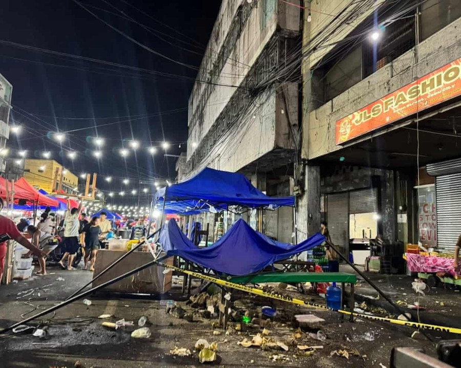 Một khu chợ ở Cebu chịu ảnh hưởng của động đất. Ảnh: Getty Images 4688.jpg