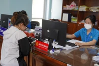 Vì sao nhiều công chức chưa nhận được lương theo mức mới từ ngày 1-7?