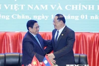 Việt Nam-Lào gìn giữ và làm sâu sắc hơn quan hệ đặc biệt giữa hai nước