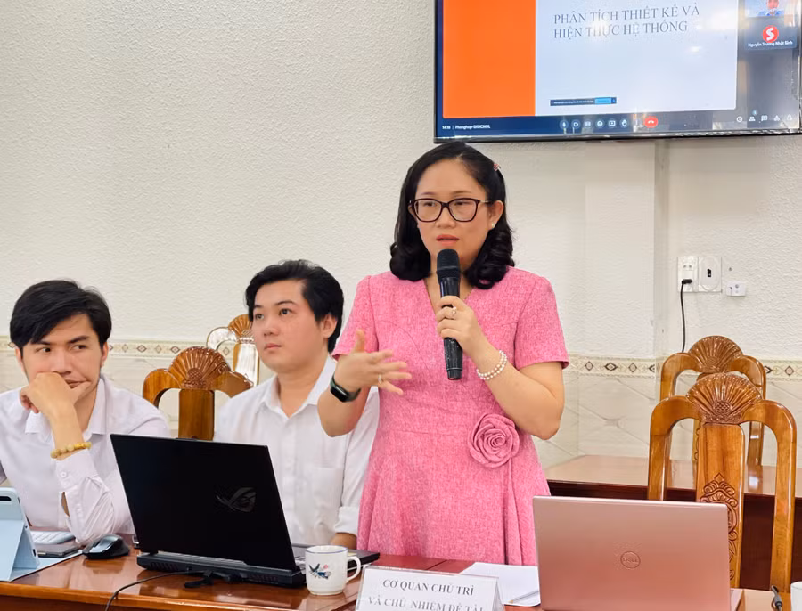 Tiến sĩ Dương Thị Thùy Vân-Chủ nhiệm đề tài báo cáo kết quả nghiên cứu tại hội nghị. Ảnh: Trần Dung