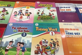 SGK Tiếng Việt lớp 1 vừa phát hành: Nên thu hồi!