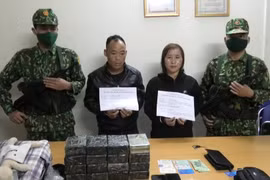 Bắt 2 nghi phạm vận chuyển 32 bánh heroin