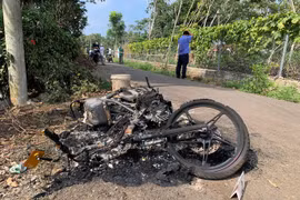 Nghi can ôm thi thể cô gái bị cháy trốn dưới giếng