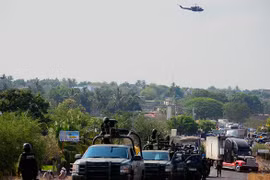 Tìm thấy 12 thi thể đầy vết đạn chất trên xe bán tải