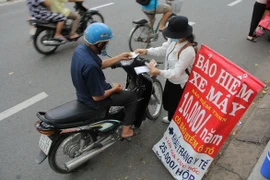 Bảo hiểm xe máy: 'Có vấn đề' về cách thức triển khai, sửa sai thế nào?