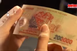 Xem số seri trên tờ tiền biết được tiền giả hay thật?