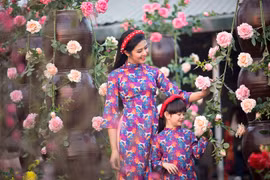 Hoa hậu Ngọc Hân xúng xính áo dài trong ngày Tết Đinh Dậu