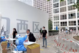 Trung Quốc nới lỏng biện pháp phòng-chống dịch Covid-19