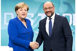 Đức: Bà Merkel nhượng bộ, EU trút được gánh nặng