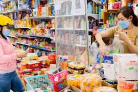 Thị trường bánh mứt Tết: Ít hàng, sức mua chậm