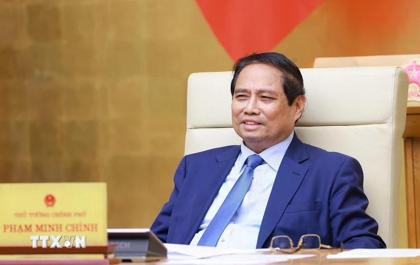 នាយករដ្ឋមន្ត្រី Pham Minh Chinh បានដឹកនាំកិច្ចប្រជុំរដ្ឋាភិបាលស្តីពីវិមជ្ឈការ និងគណៈប្រតិភូអំណាច។ រូបថត៖ Duong Giang/VNA phanquyen.jpg
