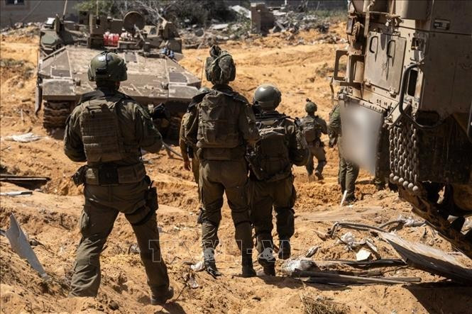 Binh sĩ Israel tham gia chiến dịch quân sự tại Dải Gaza ngày 6-5. Ảnh TTXVN binh-si-israel-tham-gia-chien-dich-quan-su-tai-dai-gaza-ngay-6-5-anh-ttxvn.jpg
