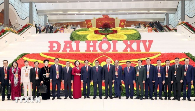 Các đại biểu dự phiên khai mạc Đại hội chụp ảnh lưu niệm. (Ảnh: TTXVN)