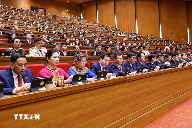 Các đại biểu dự phiên khai mạc Đại hội XIV của Đảng. (Ảnh: TTXVN)