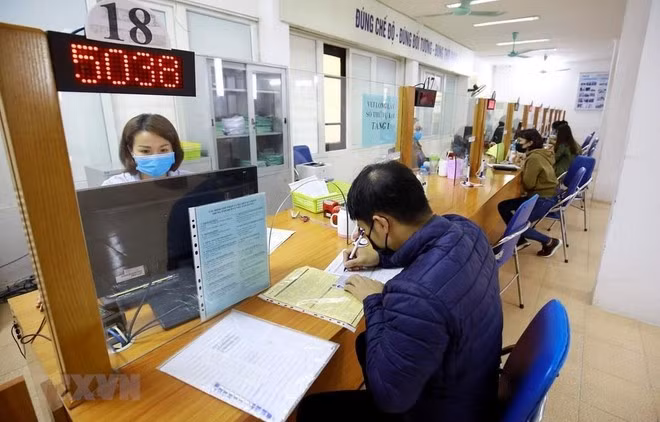 Cán bộ, công chức dự kiến bố trí làm việc tại các xã mới đều là đối tượng chịu sự tác động trực tiếp của việc thực hiện sắp xếp tổ chức bộ máy và thuộc đối tượng áp dụng theo Nghị định số 178/2024/NĐ-CP. Ảnh: PV/Vietnam+