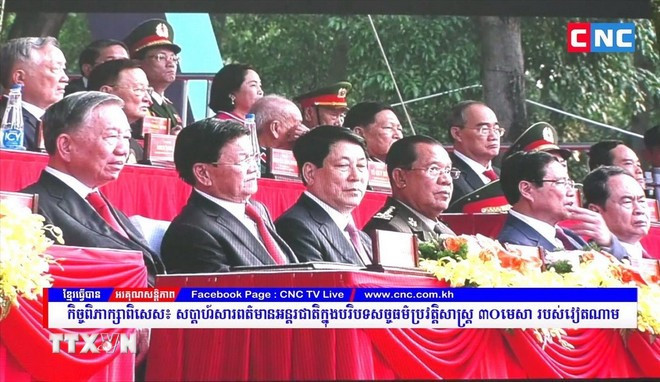 Đài truyền hình CNC TV phát hình ảnh Lãnh đạo Đảng, Nhà nước Việt Nam và lãnh đạo Campuchia, Lào (ảnh chụp màn hình) tham dự lễ kỷ niệm 50 năm Ngày Giải phóng miền Nam, thống nhất đất nước (30/4/1975 - 30/4/2025) tại Thành phố Hồ Chí Minh. Ảnh: TTXVN phát Đài truyền hình CNC TV phát hình ảnh Lãnh đạo Đảng, Nhà nước Việt Nam và lãnh đạo Campuchia, Lào (ảnh chụp màn hình) tham dự lễ kỷ niệm 50 năm Ngày Giải phóng miền Nam, thống nhất đất nước (30/4/1975 - 30/4/2025) tại Thành phố Hồ Chí Minh. Ảnh: TTXVN phát
