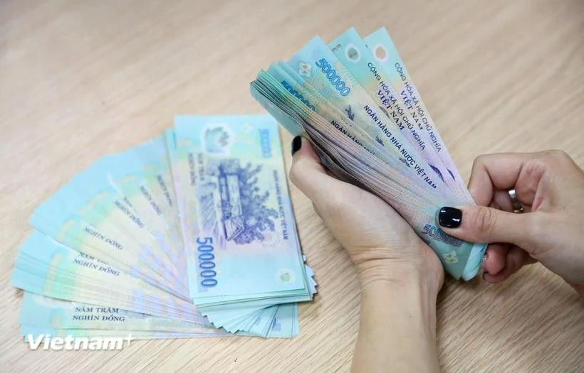 Bộ Nội vụ hướng dẫn thực hiện chế độ theo Nghị định số 178/2024/NĐ-CP cho cán bộ đơn vị hành chính cấp xã không sáp nhập. Ảnh: PV/Vietnam+ cb-xa.jpg