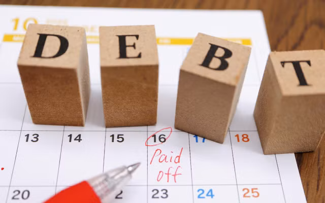 Nhiều doanh nghiệp dồn lực trả nợ trước Tết. Ảnh minh họa