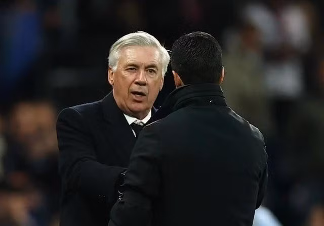 HLV Ancelotti chịu sức ép lớn sau khi Real Madrid chia tay ngai vàng Champions League. Ảnh: Reuters