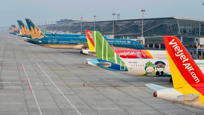 Máy bay của các hãng hàng không Việt Nam tại Sân bay Quốc tế Nội Bài. (Ảnh: PV/Vietnam+) Máy bay của các hãng hàng không Việt Nam tại Sân bay Quốc tế Nội Bài. (Ảnh: PV/Vietnam+)
