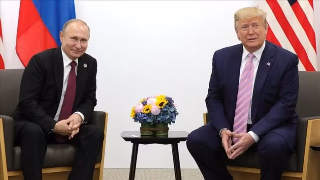 Hai ông Trump (phải) và Putin. Ảnh: Anadolu