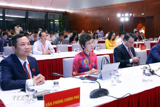 Các đại biểu tham dự buổi họp báo. (Ảnh: Phạm Kiên/TTXVN) Các đại biểu tham dự buổi họp báo. (Ảnh: Phạm Kiên/TTXVN)
