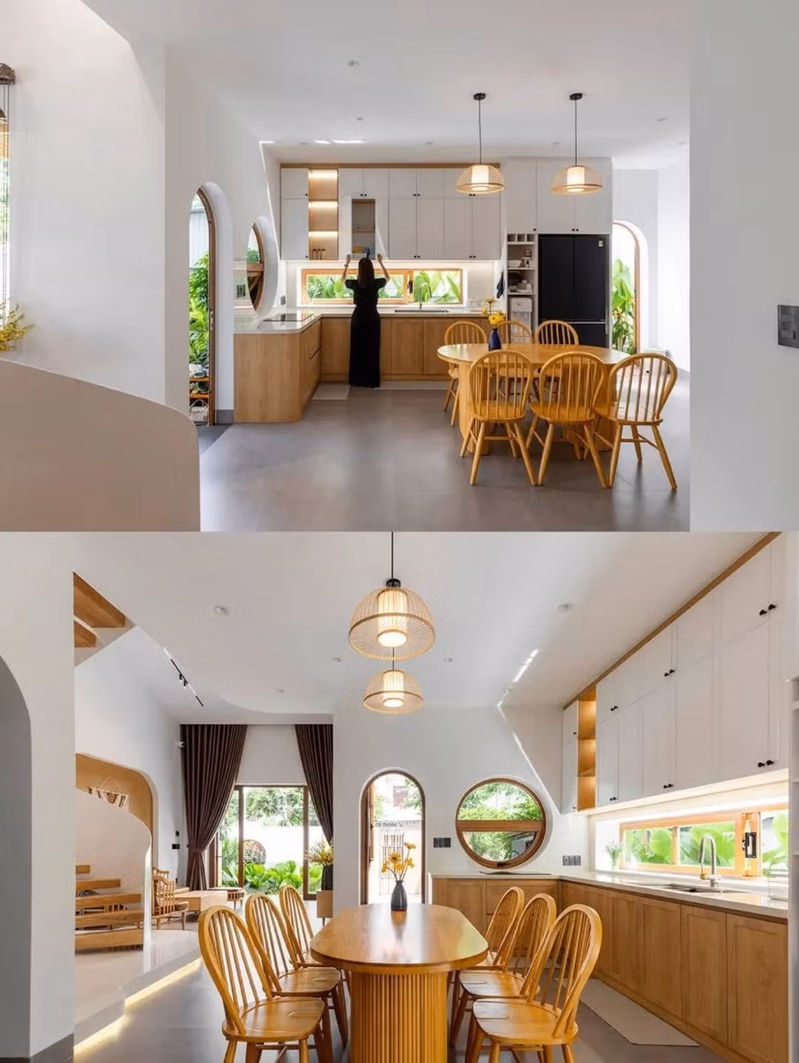 Bên trong, ngôn ngữ thiết kế tiếp nối sự uyển chuyển với tường cong, cửa vòm và vật liệu tự nhiên như gỗ sáng, terrazzo, tông kem trung tính.