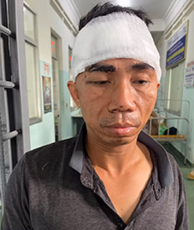 Đối tượng Trần Quốc Việt sau khi bị bắt