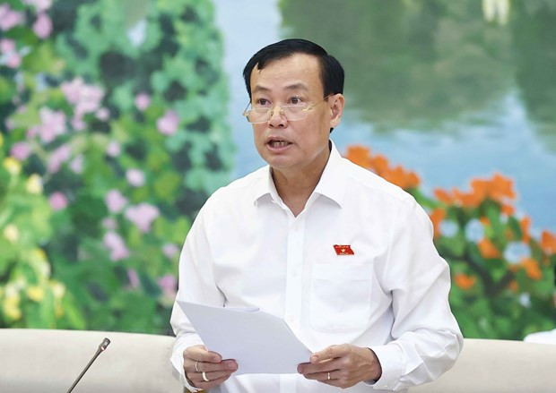 Chủ nhiệm Ủy ban Quốc phòng-An ninh của Quốc hội Lê Tấn Tới trình bày báo cáo. (Ảnh: Doãn Tấn/TTXVN) Chủ nhiệm Ủy ban Quốc phòng-An ninh của Quốc hội Lê Tấn Tới trình bày báo cáo. (Ảnh: Doãn Tấn/TTXVN)