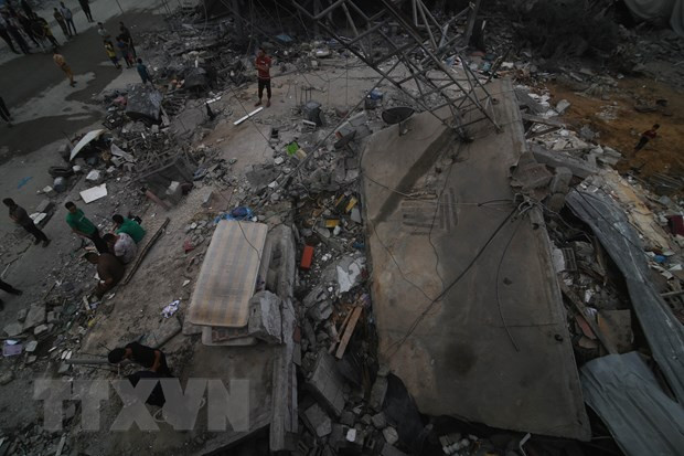 Những ngôi nhà bị phá hủy sau cuộc không kích của Israel xuống thành phố Rafah ở Dải Gaza, ngày 23/10. (Ảnh: THX/TTXVN) Những ngôi nhà bị phá hủy sau cuộc không kích của Israel xuống thành phố Rafah ở Dải Gaza, ngày 23/10. (Ảnh: THX/TTXVN)