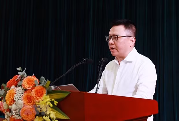 Chủ tịch Hội Nhà báo Việt Nam Lê Quốc Minh báo cáo kết quả và nhiệm vụ trong tâm của Hội Nhà báo. (Ảnh: Dương Giang/TTXVN)