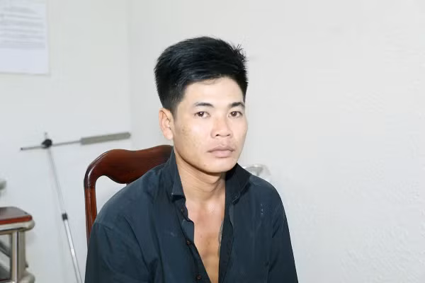 Phan Văn Đức Sinh khi bị công an bắt giữ về hành vi cướp tài sản. Ảnh C.T.V