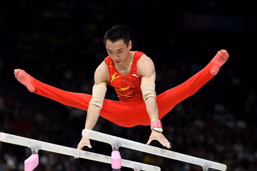 Zou Jingyuan đã xuất sắc bảo vệ thành công tấm huy chương vàng nội dung xà kép. (Nguồn: Olympic Paris)