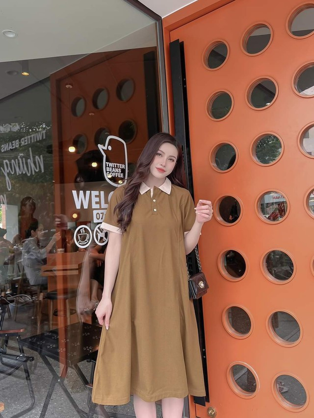Váy sơ mi với phom dáng rộng rãi, thoải mái nhưng vẫn mang vẻ ngoài chỉn chu, nhã nhặn là item xuống phố hoàn hảo đồng thời che khuyết điểm cực tốt dành cho những nàng có vòng eo "bánh mì" hoặc các "mẹ bầu" đang trong những tháng thai kì Váy sơ mi với phom dáng rộng rãi, thoải mái nhưng vẫn mang vẻ ngoài chỉn chu, nhã nhặn là item xuống phố hoàn hảo đồng thời che khuyết điểm cực tốt dành cho những nàng có vòng eo "bánh mì" hoặc các "mẹ bầu" đang trong những tháng thai kì