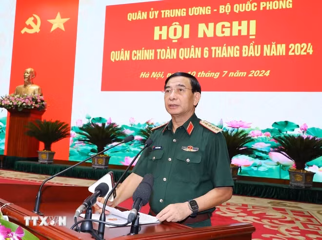 Đại tướng Phan Văn Giang, Ủy viên Bộ Chính trị, Phó Bí thư Quân ủy Trung ương, Bộ trưởng Bộ Quốc phòng phát biểu khai mạc hội nghị. (Ảnh: Trọng Đức/TTXVN) Đại tướng Phan Văn Giang, Ủy viên Bộ Chính trị, Phó Bí thư Quân ủy Trung ương, Bộ trưởng Bộ Quốc phòng phát biểu khai mạc hội nghị. (Ảnh: Trọng Đức/TTXVN)