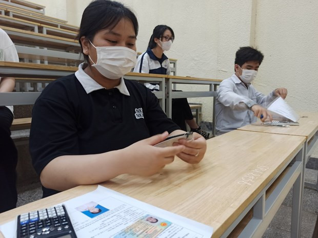 Thí sinh dự thi đánh giá năng lực vào Đại học Sư phạm Hà Nội năm 2023. (Ảnh: Phạm Mai/Vietnam+) Thí sinh dự thi đánh giá năng lực vào Đại học Sư phạm Hà Nội năm 2023. (Ảnh: Phạm Mai/Vietnam+)