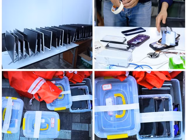 Gần 500 chiếc điện thoại, hàng chục máy vi tính được thu giữ từ các đối tượng