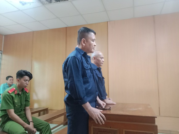 Hai bị cáo tại phiên xét xử