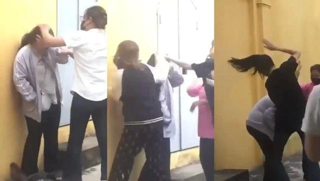 Hình ảnh cắt từ video clip nữ sinh bị nhóm nữ sinh đánh. CẮT TỪ CAMERA