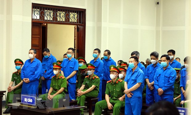 Các bị cáo tại phiên tòa ngày 19/4. (Ảnh: Đức Hiếu/TTXVN)