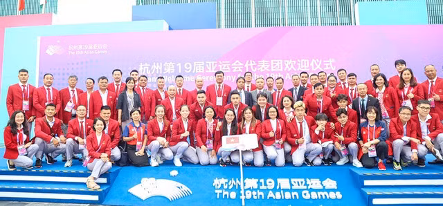 Đoàn thể thao VN tham dự lễ thượng cờ ASIAD 19. Ảnh: Quý Lượng