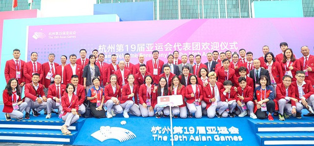 Đoàn thể thao VN tham dự lễ thượng cờ ASIAD 19. Ảnh: Quý Lượng