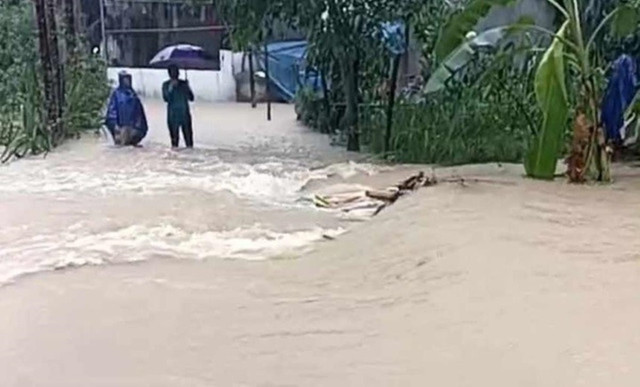 Khu vực bà T. và con bị nước lũ cuốn. Ảnh: A. Sơn Khu vực bà T. và con bị nước lũ cuốn. Ảnh: A. Sơn