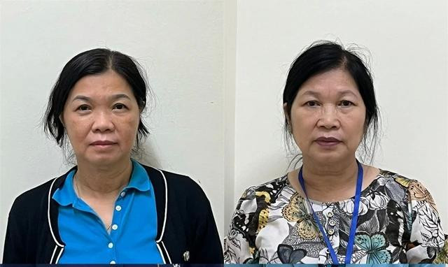 Các bị can Đinh Thị Mộng Thanh và Nguyễn Thị Hiệu. Ảnh: BCA