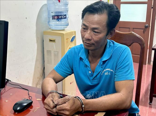 Đối tượng Phi tại cơ quan công an. Ảnh: TTXVN phát Đối tượng Phi tại cơ quan công an. Ảnh: TTXVN phát