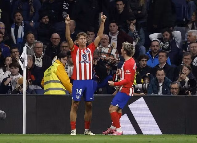 Marcos Llorente giúp Atletico Madrid có 1 điểm quý giá. Ảnh: REUTERS