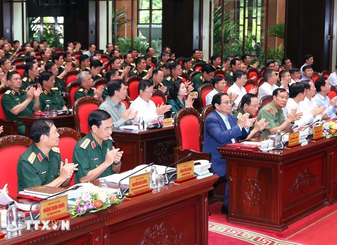 Thủ tướng Phạm Minh Chính và các đồng chí và các đại biểu dự hội nghị. (Ảnh: Trọng Đức/TTXVN)