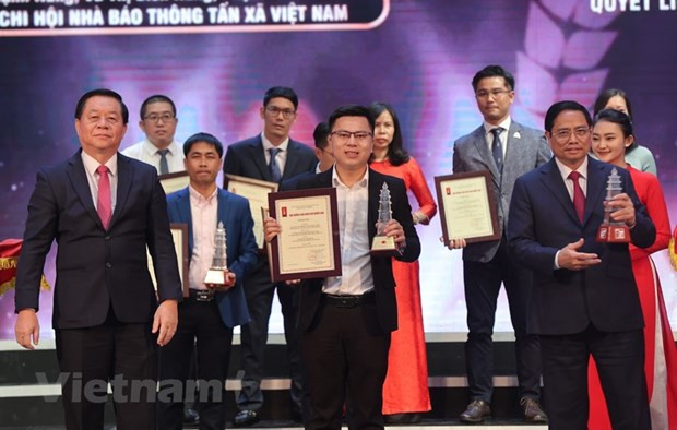 Phóng viên Báo Điện tử VietnamPlus được trao giải A tại Giải Báo chí Quốc gia lần thứ 16 năm 2021. (Ảnh: Hoài Nam/Vietnam+) Phóng viên Báo Điện tử VietnamPlus được trao giải A tại Giải Báo chí Quốc gia lần thứ 16 năm 2021. (Ảnh: Hoài Nam/Vietnam+)