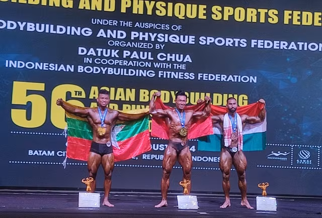 Nguyễn Thanh Tiên (giữa) mang về tấm HCV thứ 7 cho đội tuyển thể hình Việt Nam Nguyễn Thanh Tiên (giữa) mang về tấm HCV thứ 7 cho đội tuyển thể hình Việt Nam